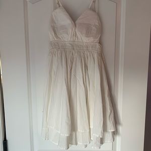 Short flowy white dress with adjustable straps